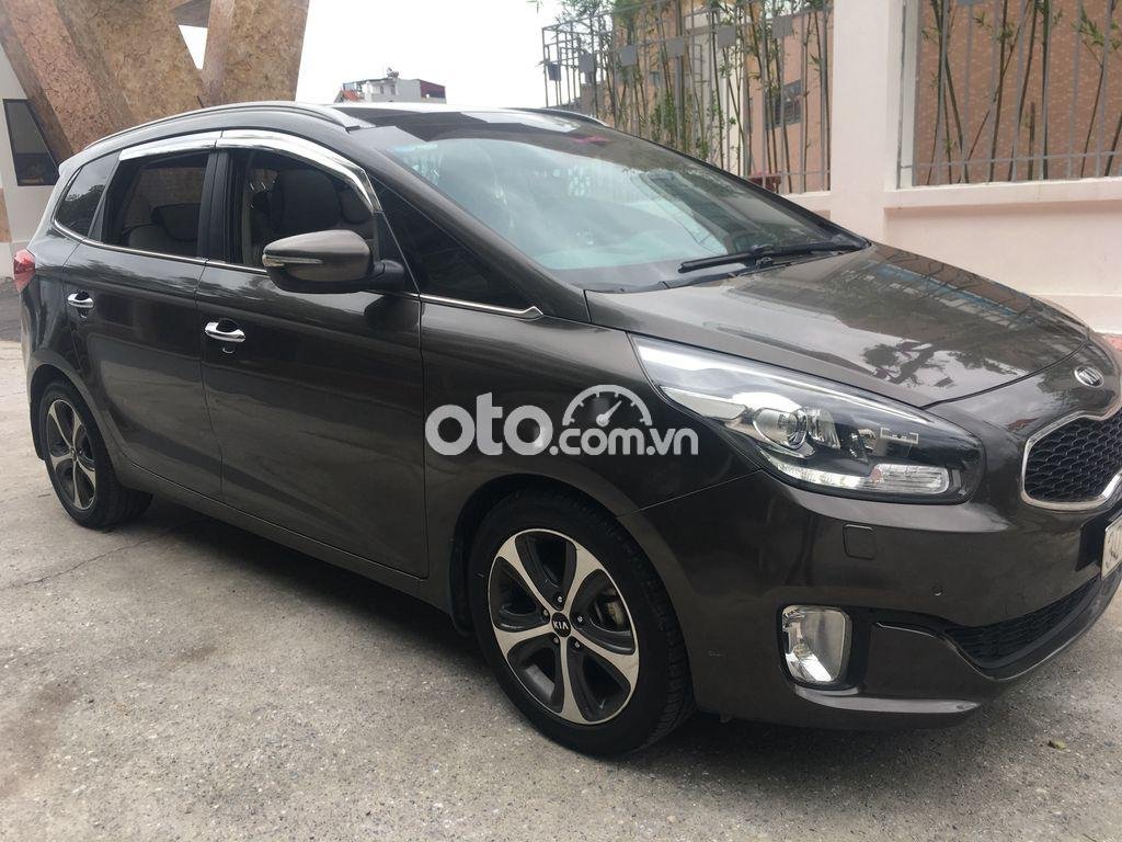 Kia Rondo 2015 - Bán Kia Rondo năm 2015, màu nâu, 495tr