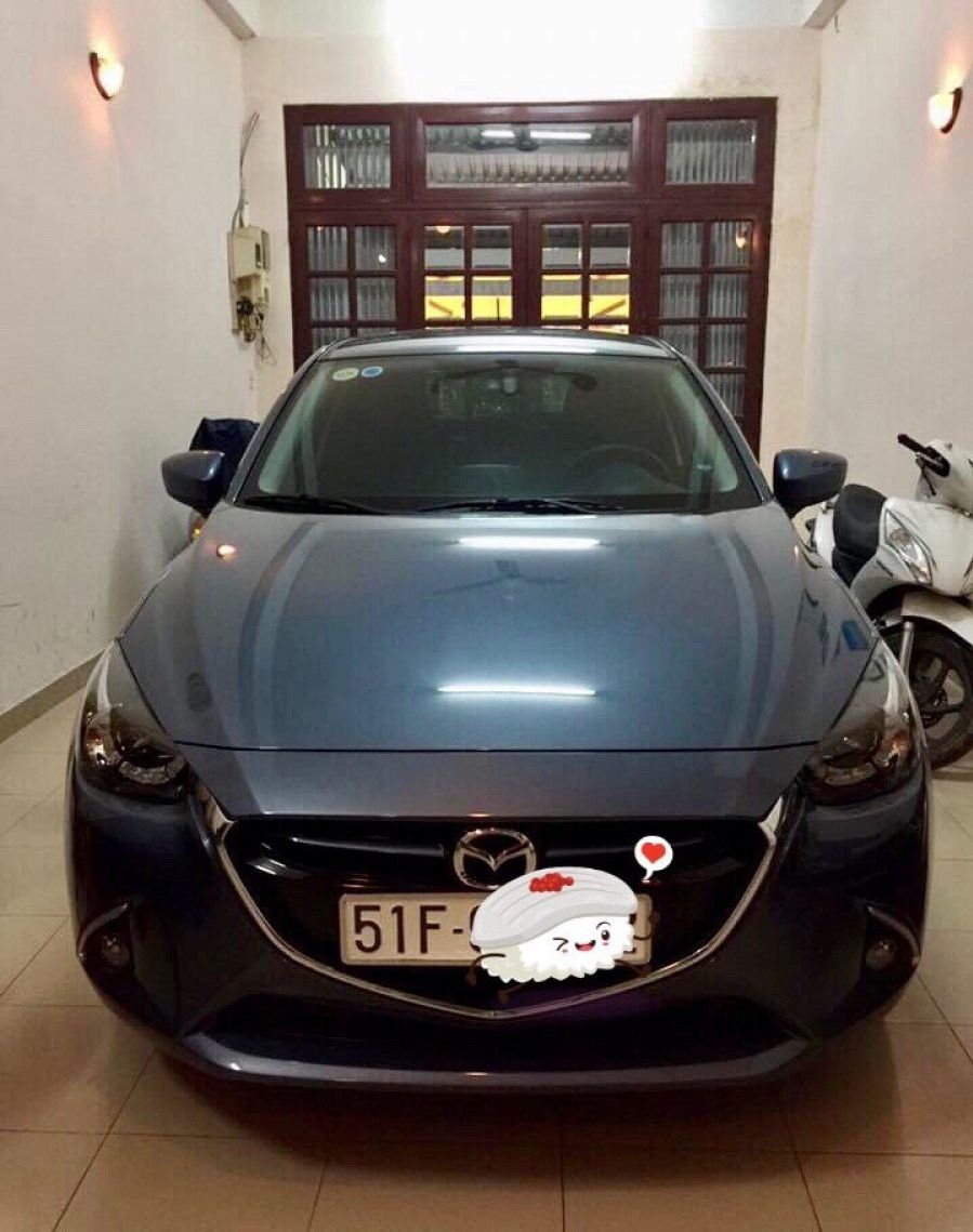 Mazda 2 2016 - Cần bán gấp Mazda 2 sản xuất 2016, màu xanh lam còn mới giá cạnh tranh