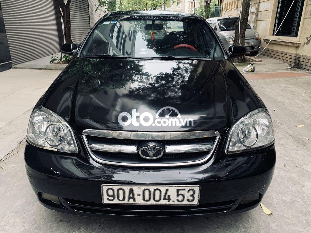 Daewoo Lacetti 2010 - Cần bán lại xe Daewoo Lacetti sản xuất năm 2010, màu đen, 165 triệu