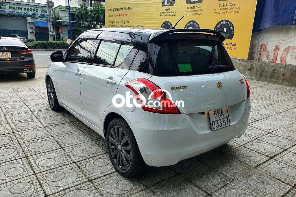 Suzuki Swift   1.4AT  2016 - Bán Suzuki Swift 1.4AT đời 2016, màu trắng