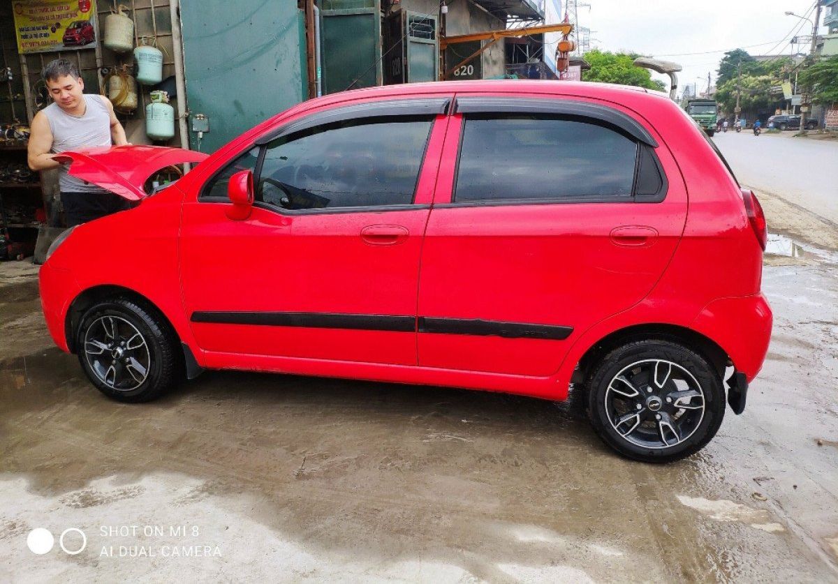 Chevrolet Spark   MT  2012 - Cần bán xe Chevrolet Spark MT đời 2012, màu đỏ còn mới, giá chỉ 115 triệu