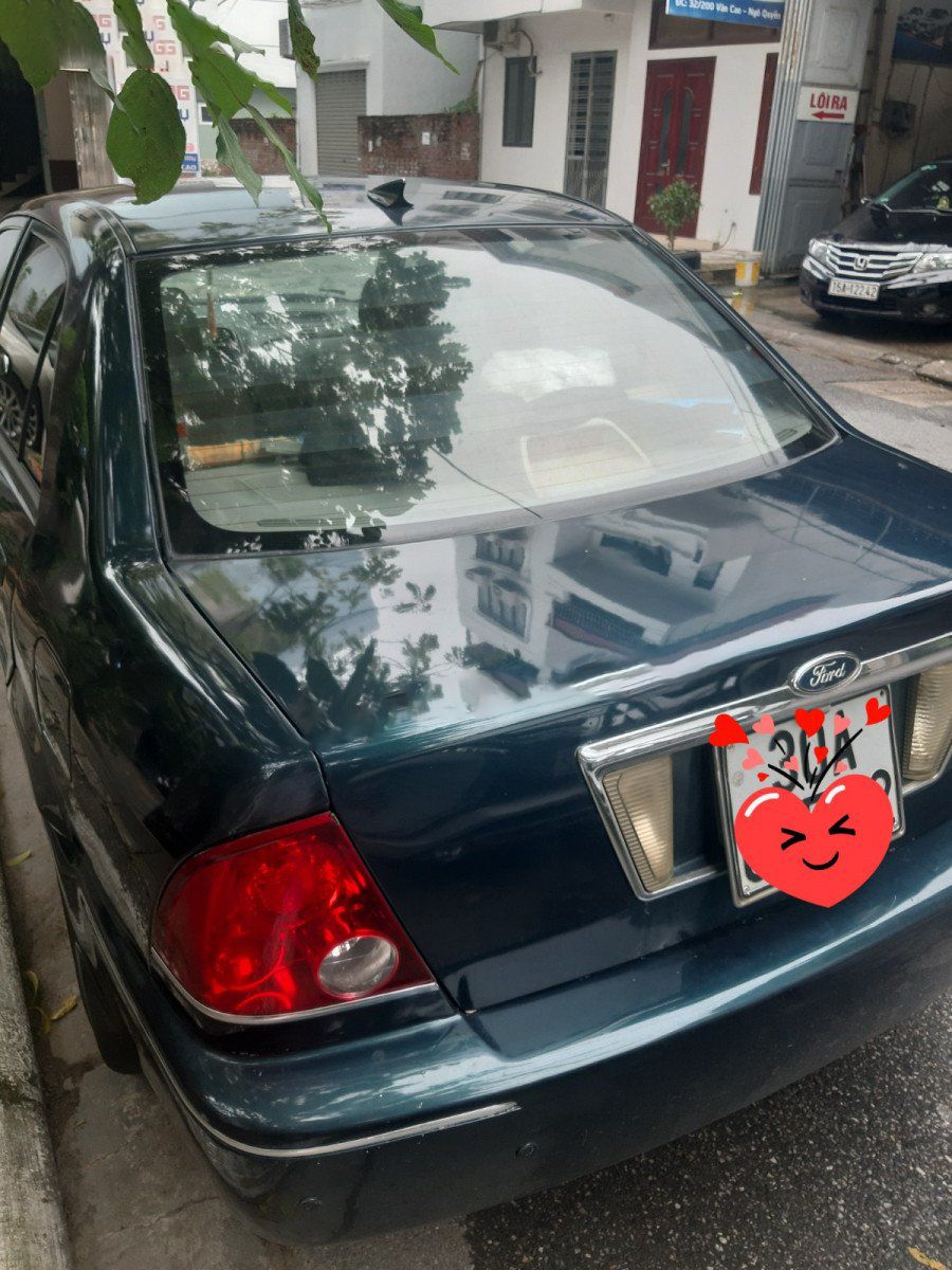 Ford Laser   LX 1.6 MT 2003 - Cần bán lại xe Ford Laser LX 1.6 MT năm 2003, màu xanh lam  