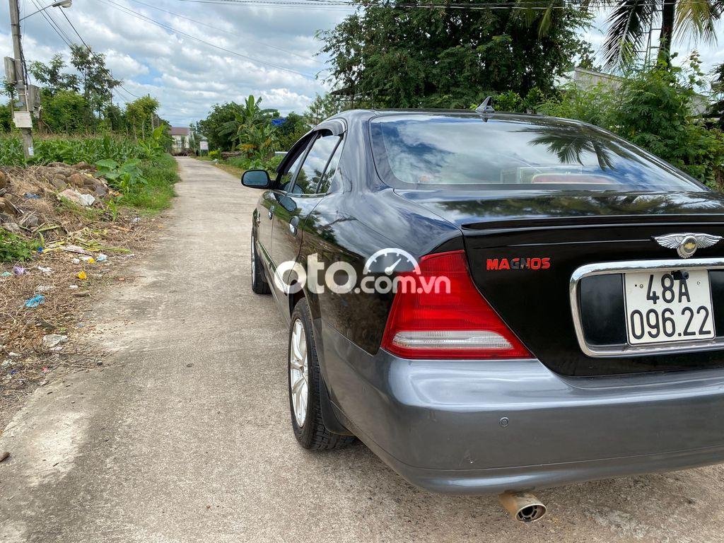 Daewoo Magnus 2004 - Cần bán gấp Daewoo Magnus 2004, màu xám còn mới, giá tốt