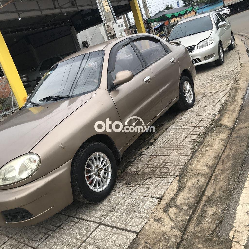 Daewoo Lanos 2002 - Cần bán Daewoo Lanos đời 2002, màu nâu, nhập khẩu nguyên chiếc, giá tốt