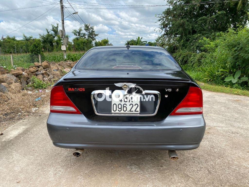 Daewoo Magnus 2004 - Cần bán gấp Daewoo Magnus 2004, màu xám còn mới, giá tốt