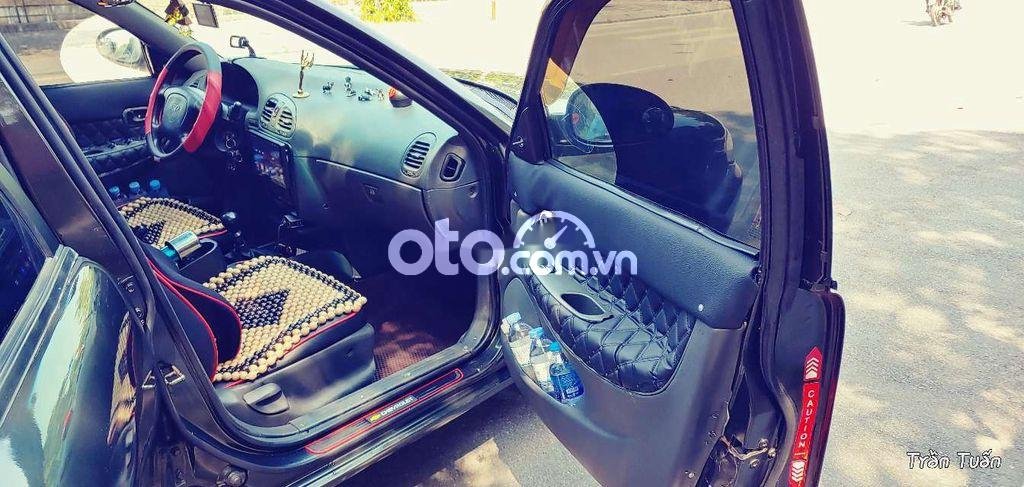 Daewoo Nubira 1999 - Cần bán gấp Daewoo Nubira sản xuất 1999, màu xám, nhập khẩu Hàn Quốc