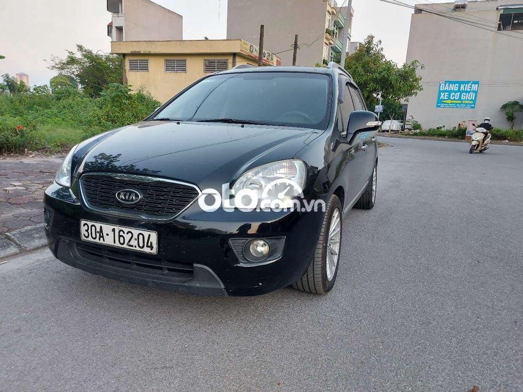 Kia Carens 2012 - Cần bán gấp Kia Carens 2012, màu đen còn mới, giá tốt