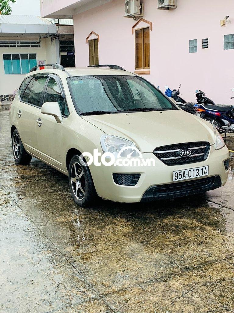 Kia Carens 2010 - Cần bán Kia Carens 2010, màu kem (be) còn mới