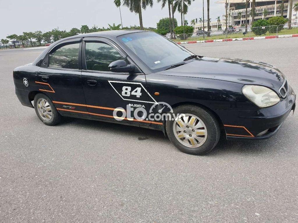 Daewoo Nubira 2002 - Bán ô tô Daewoo Nubira sản xuất 2002, màu đen còn mới giá cạnh tranh