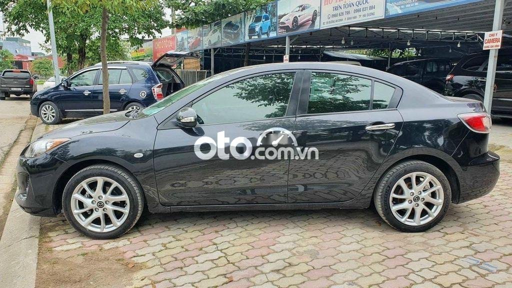 Mazda 3 2014 - Bán Mazda 3 đời 2014, màu đen còn mới, giá chỉ 385 triệu