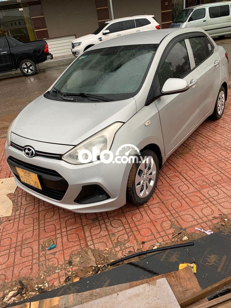 Hyundai Grand i10 2016 - Cần bán gấp Hyundai Grand i10 đời 2016, màu bạc còn mới