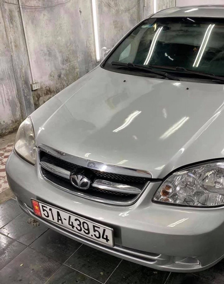 Daewoo Lacetti 2009 - Bán ô tô Daewoo Lacetti đời 2009, màu bạc