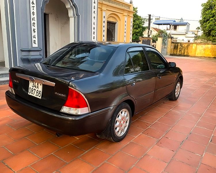 Ford Laser   Deluxe 1.6 MT 2002 - Xe Ford Laser Deluxe 1.6 MT năm 2002, màu xám