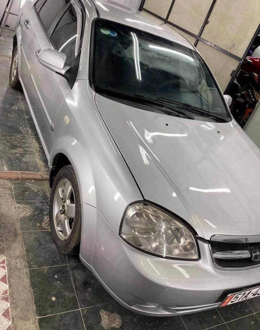 Daewoo Lacetti 2009 - Bán ô tô Daewoo Lacetti đời 2009, màu bạc