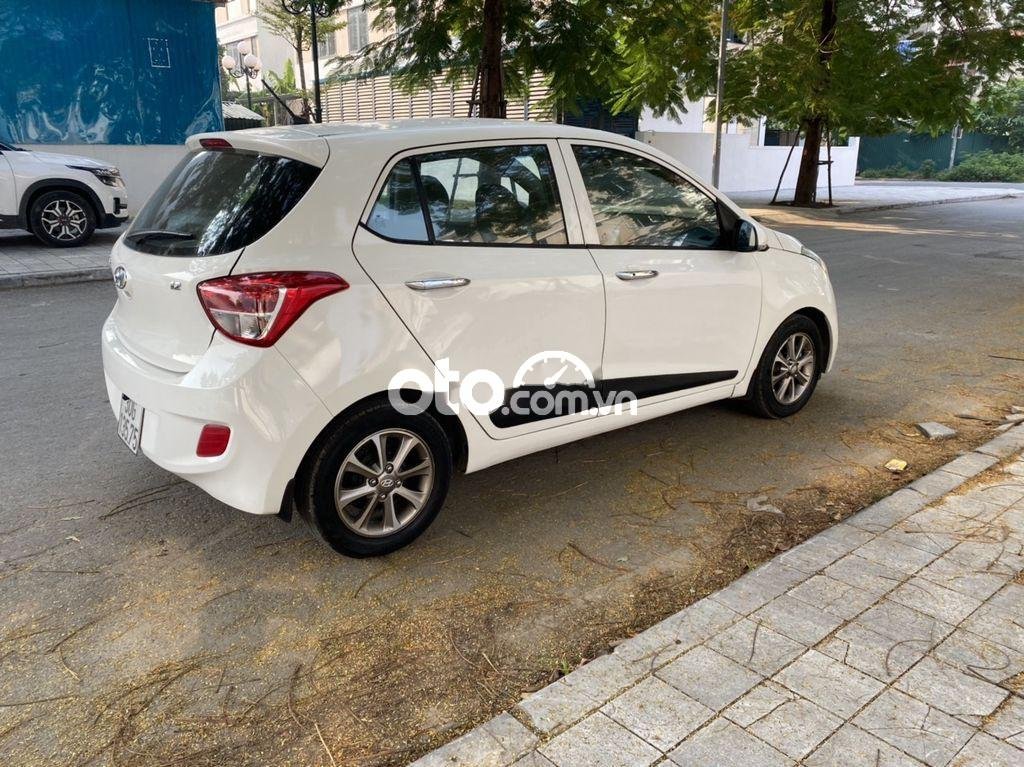 Hyundai Grand i10   2016 - Cần bán lại xe Hyundai Grand i10 2016, màu trắng còn mới