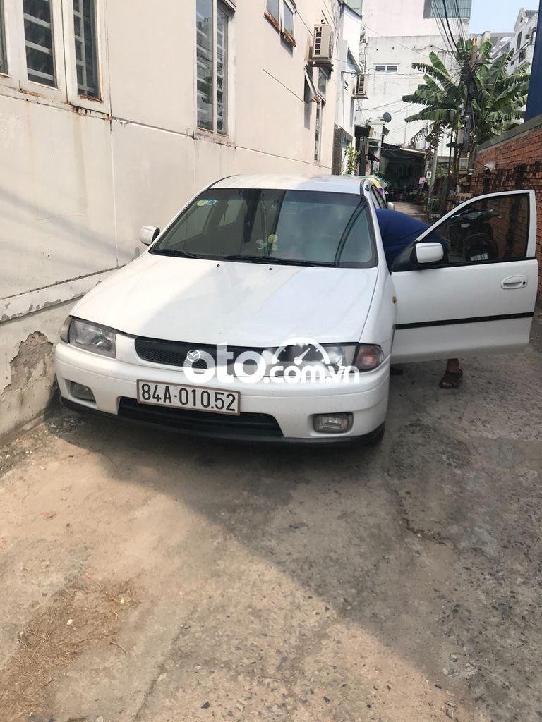 Mazda 323   1997 - Bán xe Mazda 323 đời 1997, màu trắng, nhập khẩu còn mới