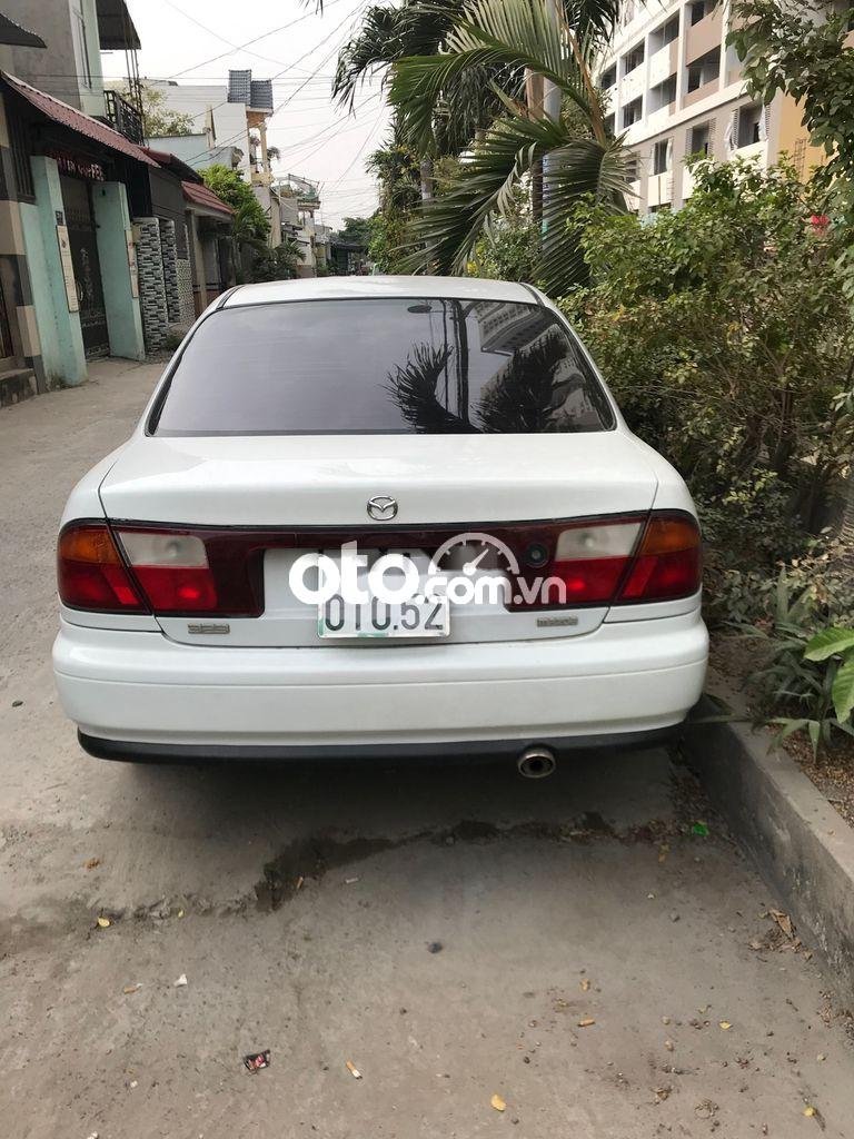 Mazda 323   1997 - Bán xe Mazda 323 đời 1997, màu trắng, nhập khẩu còn mới