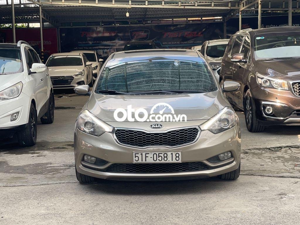 Kia K3 2014 - Bán Kia K3 2014, màu nâu còn mới giá cạnh tranh