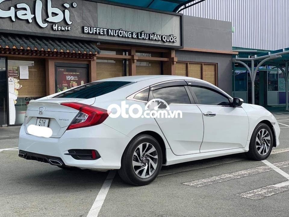 Honda Civic 2019 - Cần bán Honda Civic sản xuất 2019, màu trắng, xe nhập như mới, 606 triệu