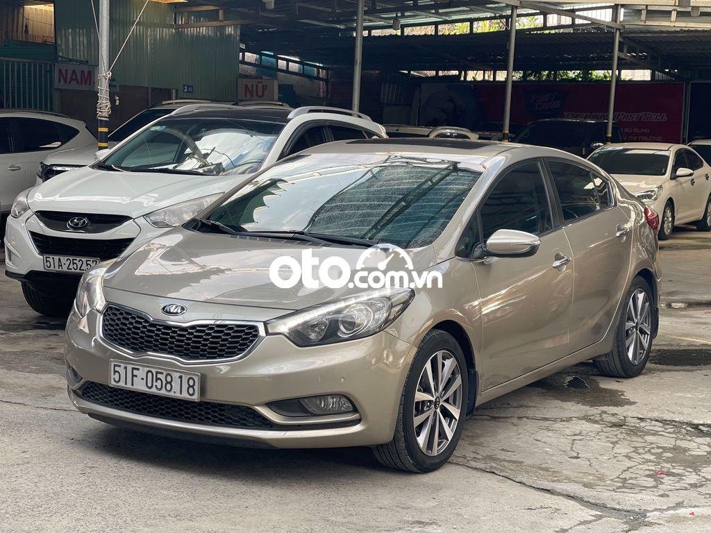 Kia K3 2014 - Bán Kia K3 2014, màu nâu còn mới giá cạnh tranh