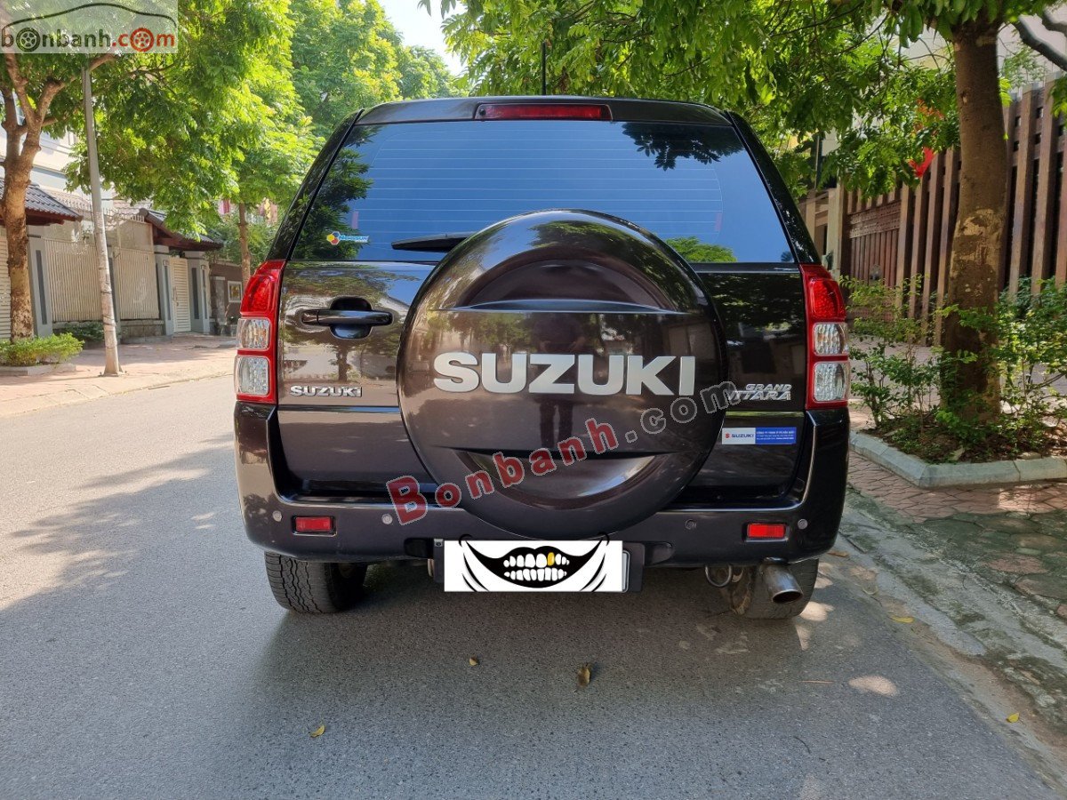 Suzuki Grand vitara   2.0L AT 4X4 2015 - Cần bán xe Suzuki Grand vitara 2.0L AT 4X4 2015, màu nâu, xe nhập