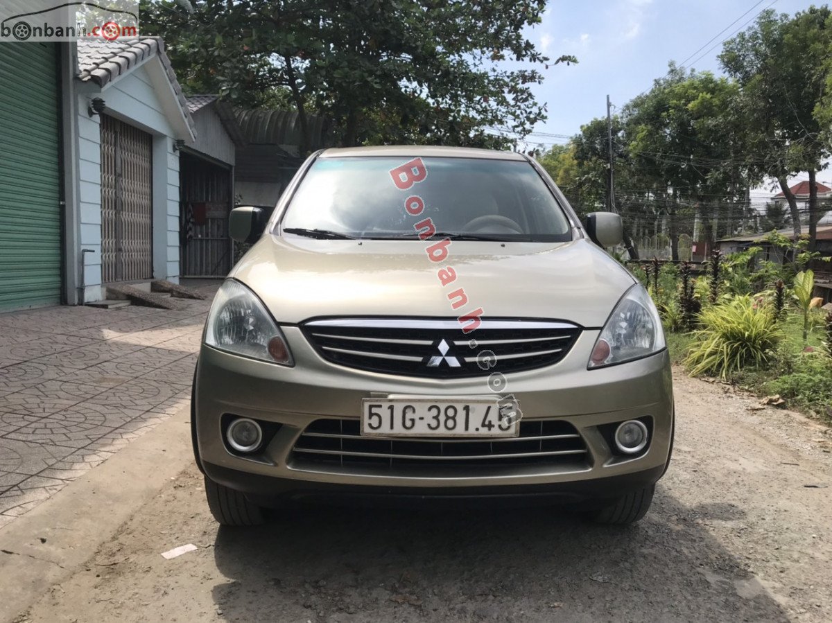 Mitsubishi Zinger   2.4 GLS   2009 - Xe Mitsubishi Zinger 2.4 GLS đời 2009, màu vàng còn mới  