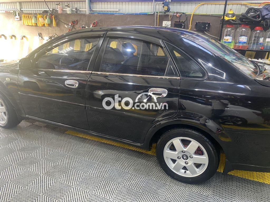 Daewoo Lacetti 2004 - Bán xe Daewoo Lacetti sản xuất 2004, màu đen, xe nhập  