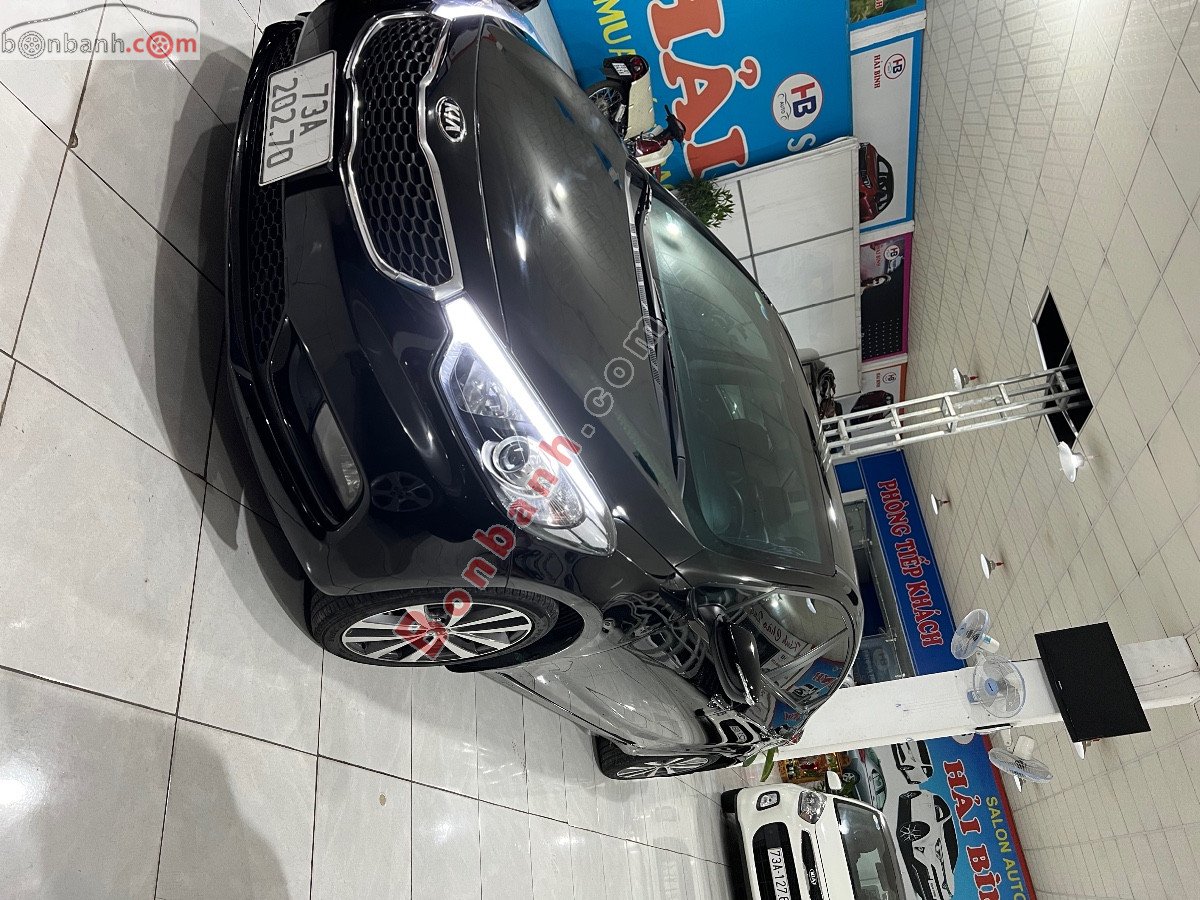 Kia K3    2014 - Xe Kia K3 sản xuất năm 2014, màu đen, nhập khẩu còn mới