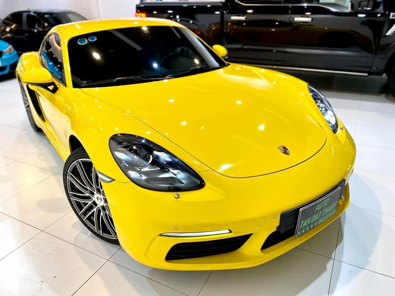 Porsche Cayman 2018 - Bán Porscher Cayman 718 2018 xe đẹp đi 15.000k, màu chuối hót bao check hãng