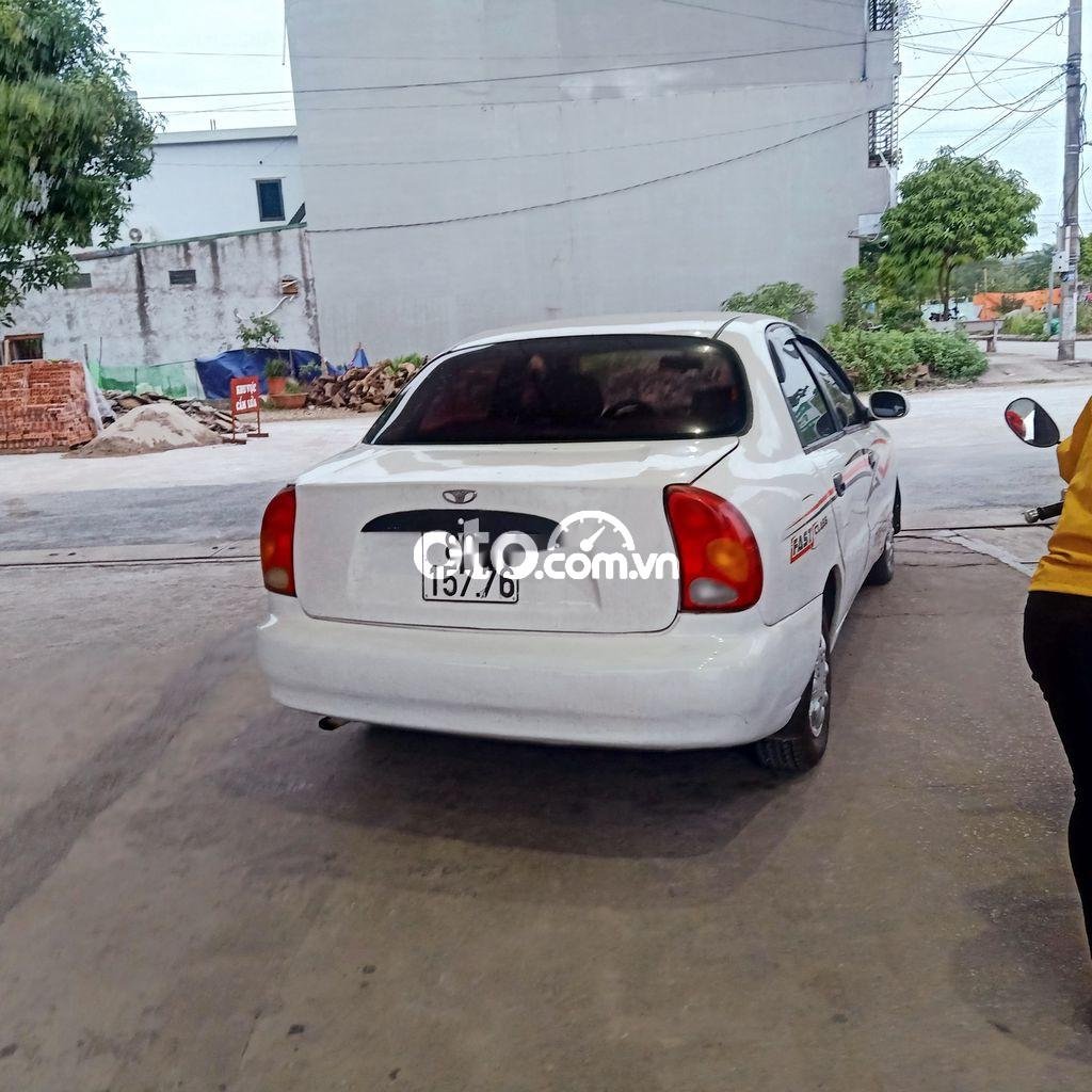 Daewoo Lanos 2003 - Cần bán Daewoo Lanos đời 2003, màu trắng, nhập khẩu nguyên chiếc xe gia đình