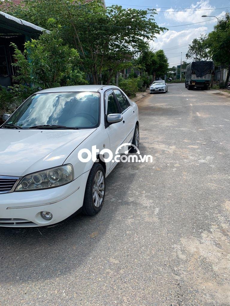 Ford Laser 2004 - Cần bán gấp Ford Laser năm sản xuất 2004, màu trắng còn mới, 145tr