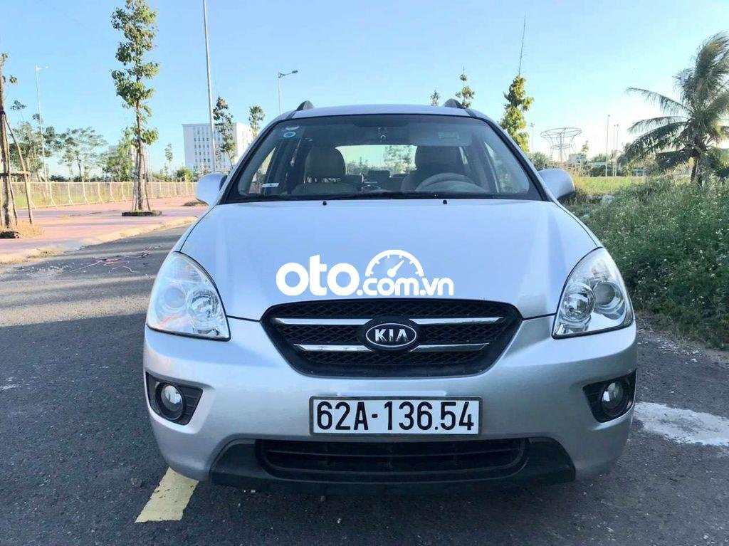 Kia Carens   EX 2.0   2010 - Bán Kia Carens EX 2.0 năm 2010, màu bạc xe gia đình 