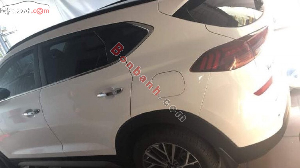 Hyundai Tucson 2021 - Cần bán lại xe Hyundai Tucson sản xuất 2021, màu trắng