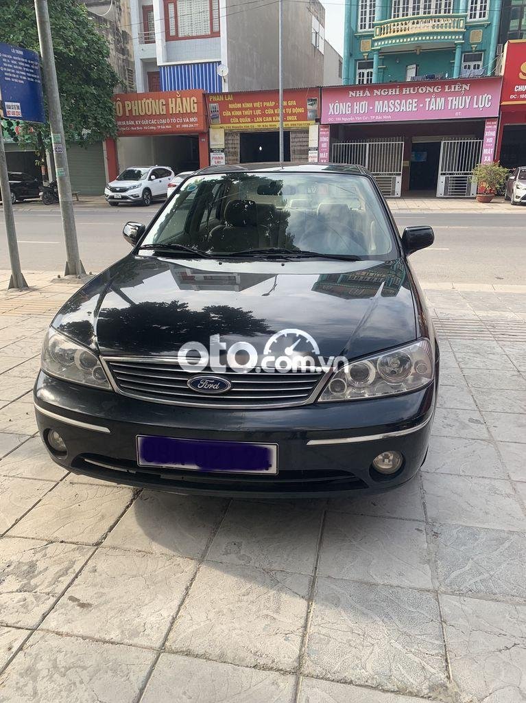 Ford Laser  AT 2004 - Bán Ford Laser AT 2004, màu đen