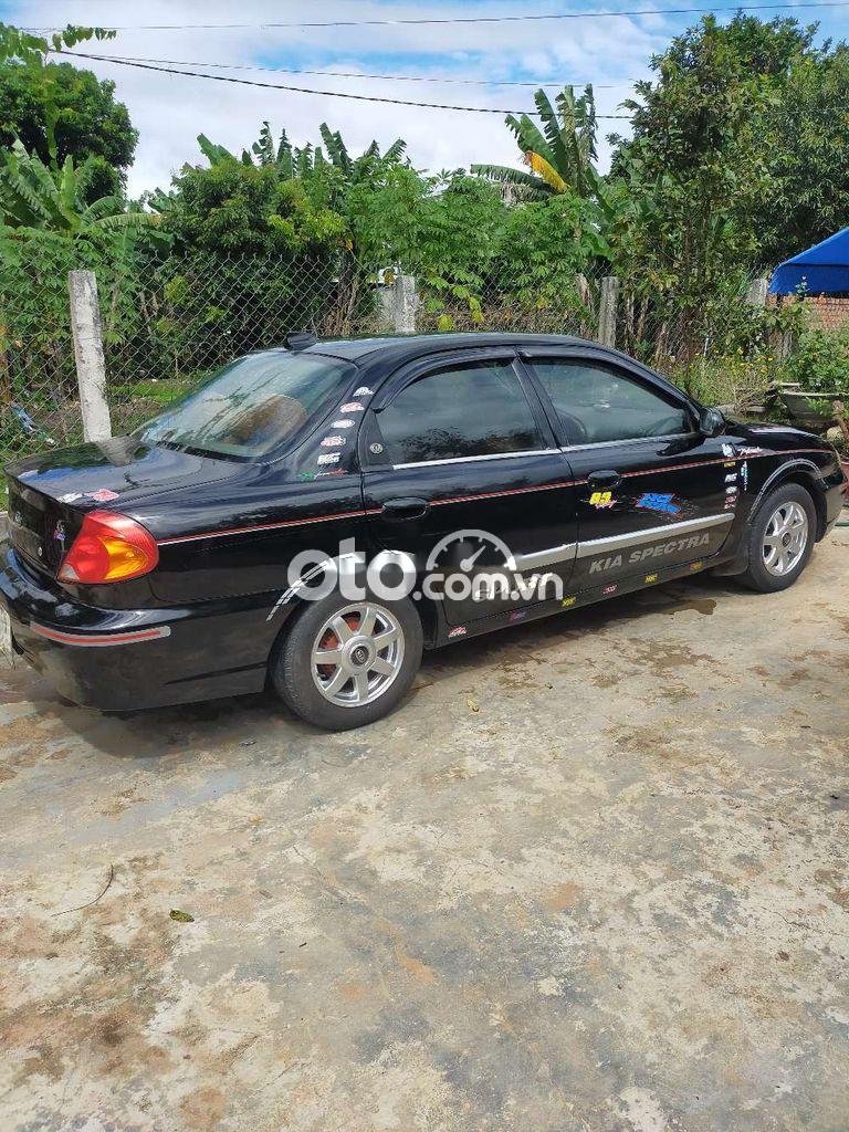 Kia Spectra 2004 - Bán xe Kia Spectra năm sản xuất 2004, màu đen, nhập khẩu, 87 triệu