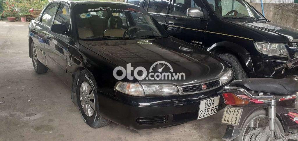 Mazda 626 1996 - Cần bán Mazda 626 năm 1996, màu đen, nhập khẩu nguyên chiếc, 62tr