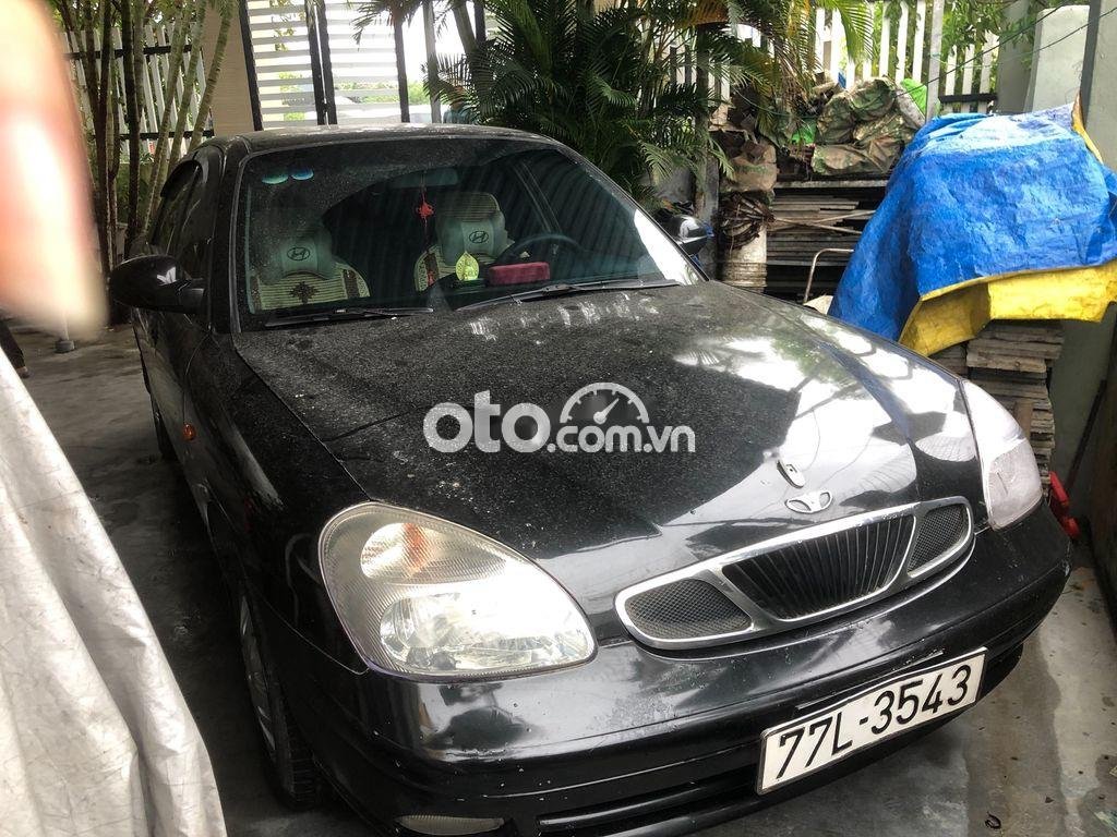 Daewoo Nubira 2003 - Cần bán Daewoo Nubira năm sản xuất 2003, màu đen, xe nhập, giá chỉ 60 triệu