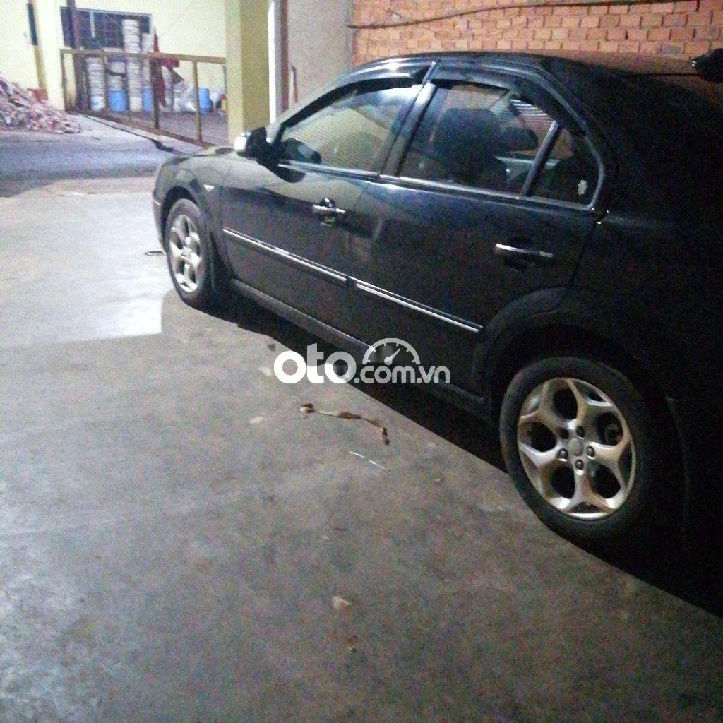 Ford Mondeo 2004 - Bán ô tô Ford Mondeo sản xuất năm 2004, màu đen, xe nhập chính chủ