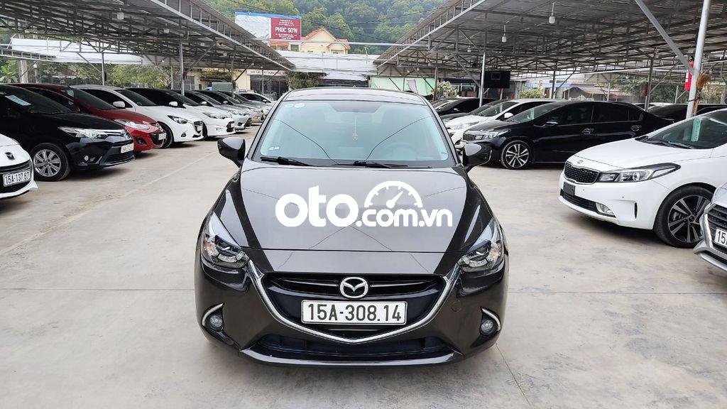 Mazda 2   1.5 AT 2016 - Cần bán Mazda 2 1.5 AT năm sản xuất 2016, màu nâu, 385 triệu