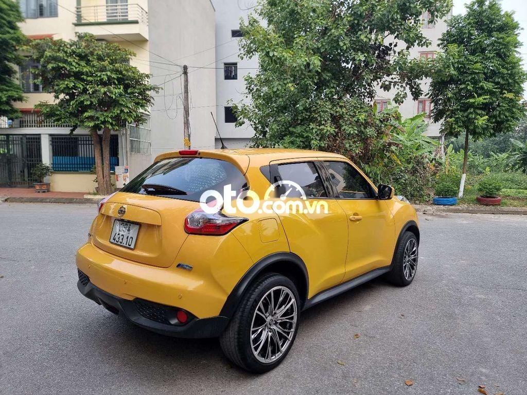 Nissan Juke 2014 - Cần bán gấp Nissan Juke đời 2014, màu vàng, nhập khẩu còn mới, giá chỉ 610 triệu