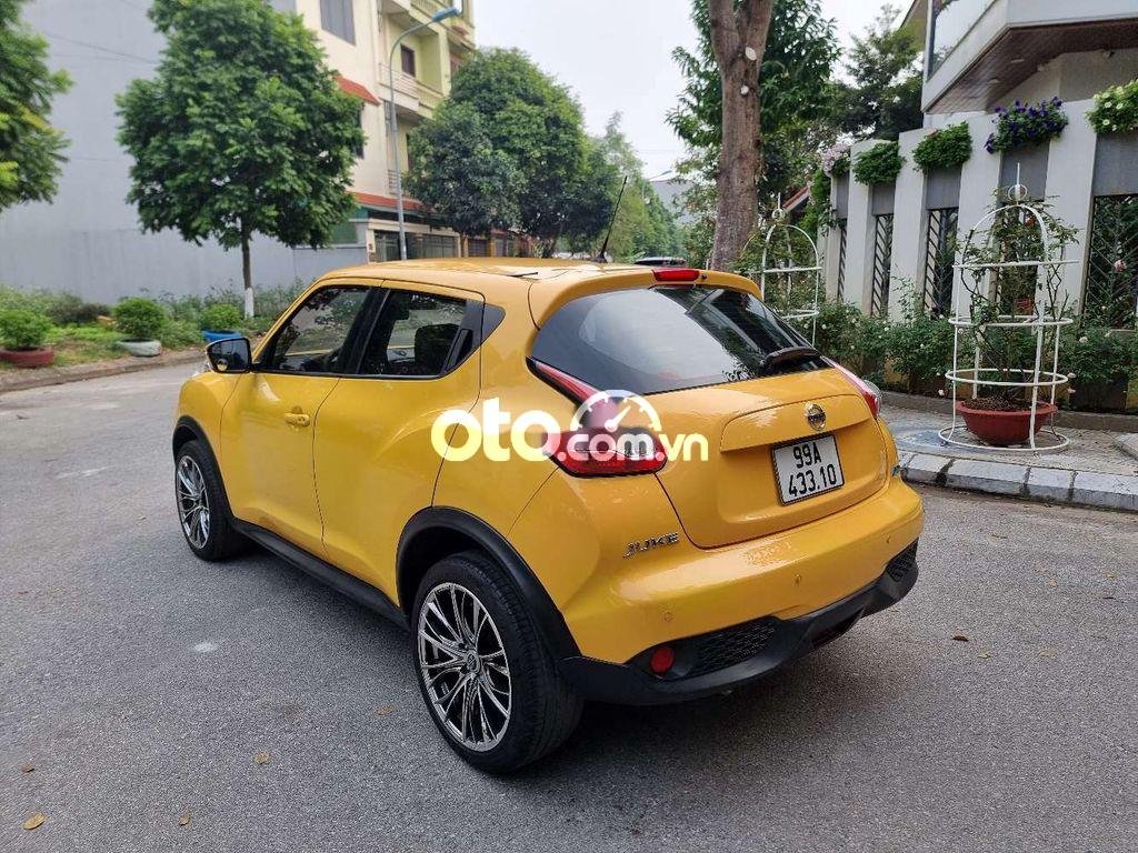 Nissan Juke 2014 - Cần bán gấp Nissan Juke đời 2014, màu vàng, nhập khẩu còn mới, giá chỉ 610 triệu