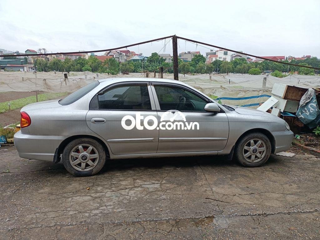 Kia Spectra 2005 - Cần bán xe Kia Spectra năm sản xuất 2005, màu bạc