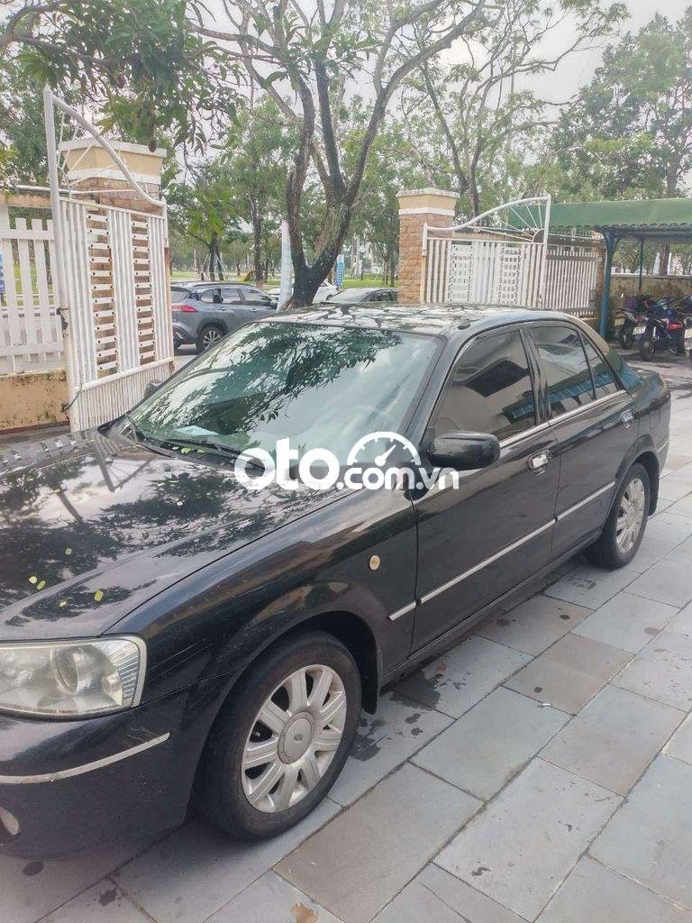 Ford Laser 2003 - Cần bán xe Ford Laser đời 2003, màu đen, nhập khẩu, giá chỉ 115 triệu