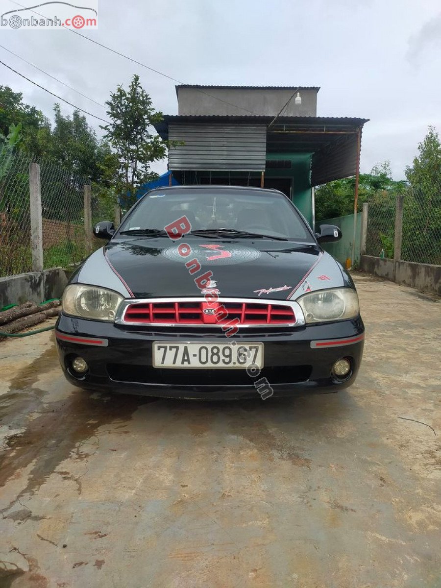 Kia Spectra 2004 - Cần bán gấp Kia Spectra đời 2004, màu đen, 85tr