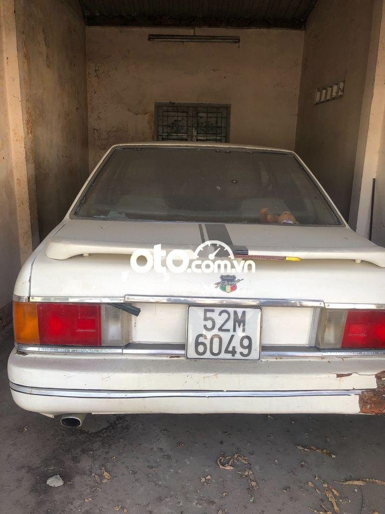 Nissan Micra 1987 - Cần bán xe Nissan Micra sản xuất năm 1987, màu trắng, nhập khẩu nguyên chiếc