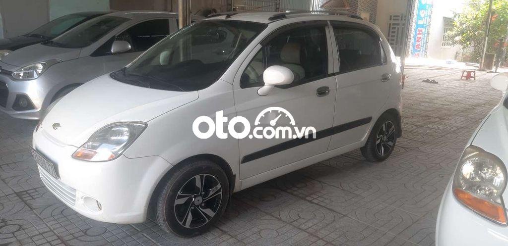 Daewoo Tico 2009 - Bán xe Chevrolet Spark đời 2009, màu trắng còn mới