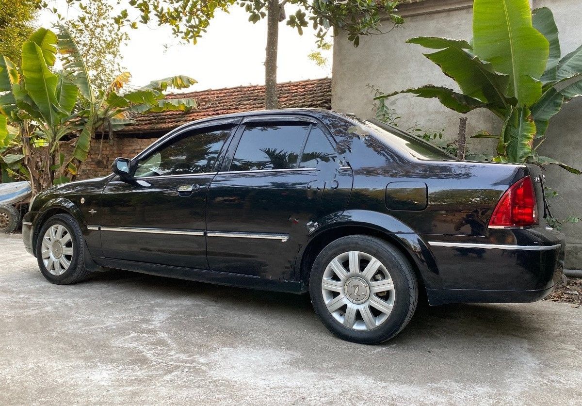 Ford Laser  1.8 AT  2003 - Bán xe Ford Laser 1.8 AT năm 2003, màu đen còn mới giá cạnh tranh