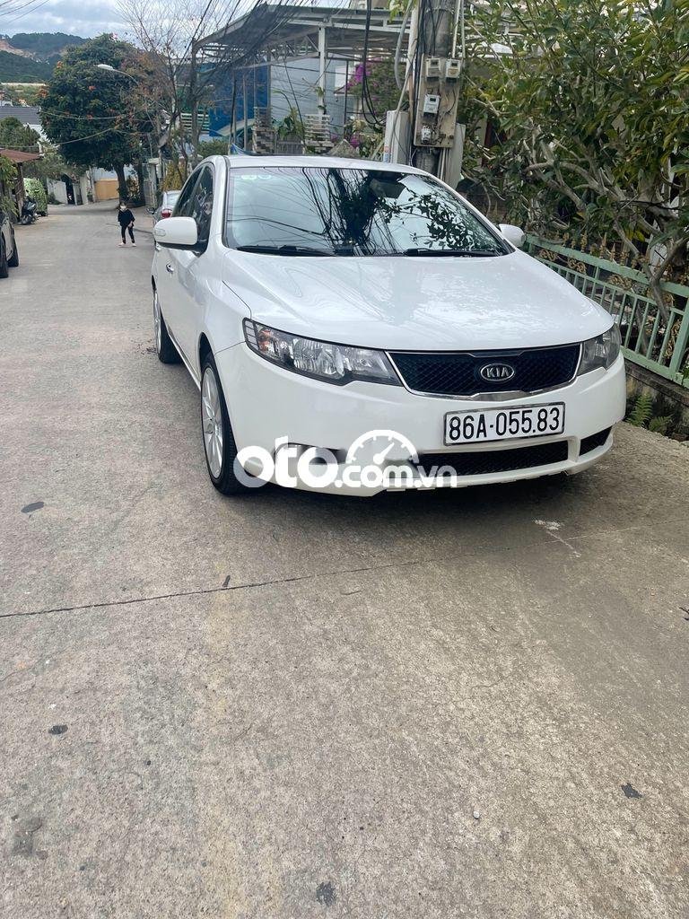 Kia Cerato 2010 - Xe Kia Cerato 2.0 đời 2010, màu trắng, xe nhập