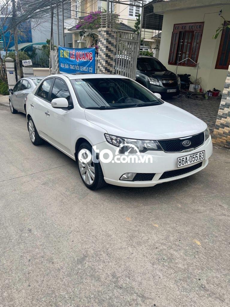 Kia Cerato 2010 - Xe Kia Cerato 2.0 đời 2010, màu trắng, xe nhập