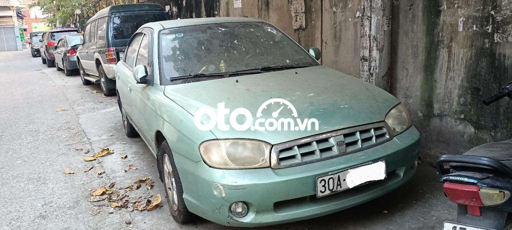 Kia Spectra 2003 - Cần bán lại xe Kia Spectra 2003, màu xanh lam, xe nhập